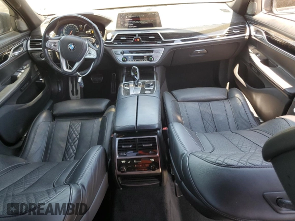 2018 BMW 7 Series 740i with VIN WBA7E2C59JG742809, listed as a Copart auction lot 66995934 with 62,017 mi miles and Salvage Title. Bid and sale history available at carsss.com. Image 8.