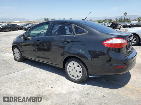 2014 Ford Fiesta S with VIN 3FADP4AJXEM128218, listed as a Copart auction lot 58033785 with 104,984 mi miles and Salvage title. Bid and sale history available at DreamBid. Image 2.