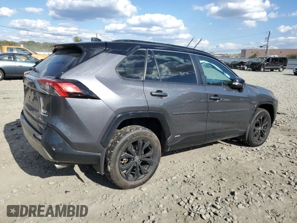 2023 Toyota RAV4 Hybrid XSE with VIN 4T3E6RFV1PU112579, listed as a Copart auction lot 74387924 with 103,340 mi miles and Salvage title. Bid and sale history available at DreamBid. Image 3.