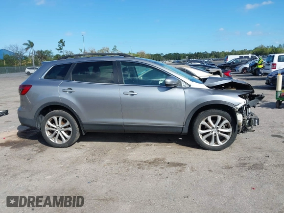 2015 Mazda CX-9 Sport with VIN JM3TB2BA1F0467162, listed as a IAAI auction lot 41565602 with 127,957 mi miles and . Bid and sale history available at carsss.com. Image 13.