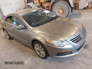2012 Volkswagen CC Sport with VIN WVWMN7AN9CE508965, listed as a IAAI auction lot 42143188 with 129,205 mi miles. Bid and sale history available at carsss.com. Image 1.