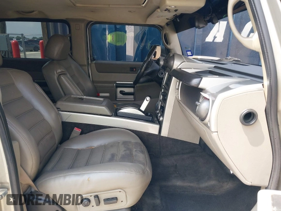 2003 Hummer H2 with VIN 5GRGN23U43H125114, listed as a IAAI auction lot 42160986 with 157,776 mi miles. Bid and sale history available at carsss.com. Image 5.