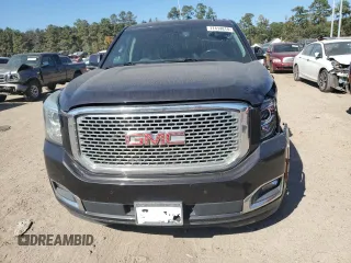 2015 GMC Yukon SLT with VIN 1GKS1BKC0FR239629, listed as a Copart auction lot 77414814 with 171,611 mi miles and Salvage Title. Bid and sale history available at carsss.com. Image 5.