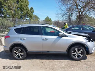 2017 Toyota RAV4 XLE with VIN 2T3RFREV1HW561295, listed as a IAAI auction lot 42049546 with 97,576 mi miles. Bid and sale history available at carsss.com. Image 13.