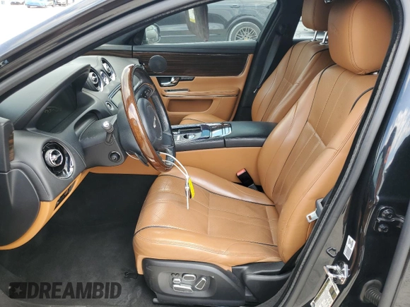 2012 Jaguar XJ with VIN SAJWA1CB5CLV27448, listed as a Copart auction lot 53373985 with 90,603 mi miles and Salvage Title. Bid and sale history available at DreamBid. Image 7.