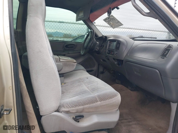 1999 Ford F-150 Work Series with VIN 1FTRF17WXXKA74403, listed as a IAAI auction lot 41525113 with 1 mi miles. Bid and sale history available at carsss.com. Image 5.