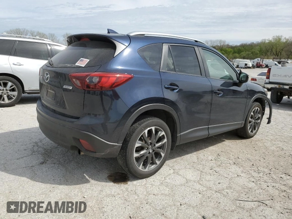 2016 Mazda CX-5 Grand Touring with VIN JM3KE4DYXG0844002, listed as a Copart auction lot 52712035 with 81,042 mi miles and Salvage Title. Bid and sale history available at DreamBid. Image 3.