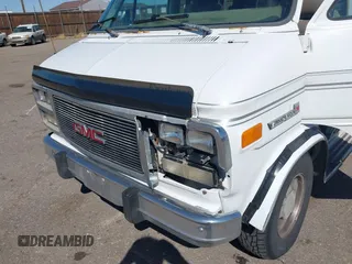 1995 GMC Vandura z VIN 1GDEG25K3SF542874, wystawiony jako IAAI lot #41792770 z przebiegiem 176 778 mil mil oraz . Historia ofert i sprzedaży dostępna na DreamBid. Obrazek 6.