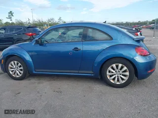 2018 Volkswagen Beetle S with VIN 3VWFD7AT5JM710121, listed as a IAAI auction lot 41264655 with 37,871 mi miles. Bid and sale history available at carsss.com. Image 14.