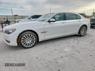 2012 BMW 7 Series 750Li xDrive with VIN WBAKC8C5XCC436134, listed as a Copart auction lot 63144905 with 64,282 mi miles and Salvage title. Bid and sale history available at DreamBid. Image 1.