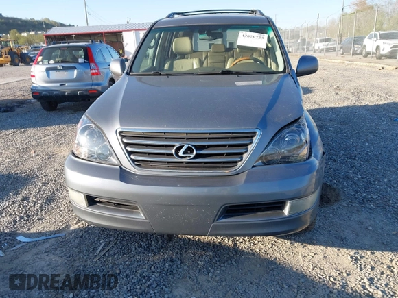 2004 Lexus GX 470 with VIN JTJBT20X440045714, listed as a IAAI auction lot 42026723 with 237,762 mi miles. Bid and sale history available at carsss.com. Image 13.
