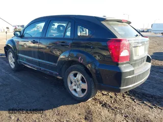 2008 Dodge Caliber SXT with VIN 1B3HB48BX8D658778, listed as a IAAI auction lot 41455439 with 165,874 mi miles. Bid and sale history available at carsss.com. Image 3.