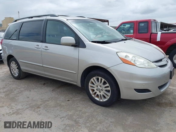 2009 Toyota Sienna XLE with VIN 5TDBK22C89S022909, listed as a IAAI auction lot 42139786 with 107,247 mi miles and . Bid and sale history available at DreamBid. Image 1.
