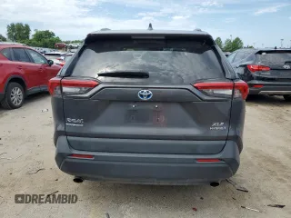 2020 Toyota RAV4 Hybrid XLE with VIN 2T3RWRFV3LW076759, listed as a Copart auction lot 60330435 with 128,274 mi miles and Salvage title. Bid and sale history available at DreamBid. Image 6.
