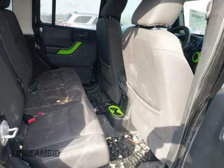 2017 Jeep Wrangler Unlimited Sahara with VIN 1C4BJWEG5HL520140, listed as a IAAI auction lot 41708084 with 74,906 mi miles. Bid and sale history available at carsss.com. Image 8.