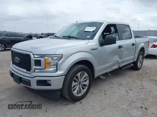 2018 Ford F-150 XL with VIN 1FTEW1CP9JKC79991, listed as a IAAI auction lot 41737265 with 123,655 mi miles and . Bid and sale history available at DreamBid. Image 2.