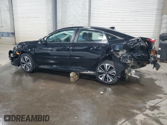2016 Honda Civic EX-L z VIN 19XFC1F76GE024753, wystawiony jako Copart lot #53569995 z przebiegiem 111 110 mil mil oraz Szkoda całkowita • Salvage title. Historia ofert i sprzedaży dostępna na DreamBid. Obrazek 2.