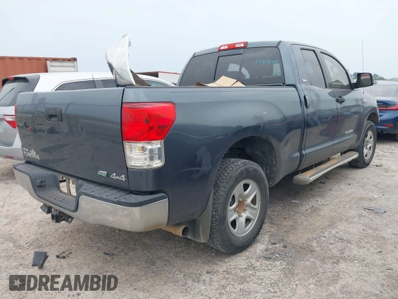 2010 Toyota Tundra z VIN 5TFUW5F10AX137509, wystawiony jako IAAI lot #42061138 z przebiegiem 139 128 mil mil oraz . Historia ofert i sprzedaży dostępna na DreamBid. Obrazek 4.