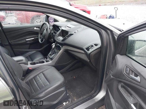 2014 Ford Escape SE with VIN 1FMCU9GX3EUB91417, listed as a IAAI auction lot 42009257 with 87,164 mi miles and . Bid and sale history available at DreamBid. Image 5.