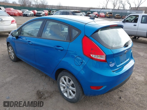 2013 Ford Fiesta SE with VIN 3FADP4EJ6DM130511, listed as a IAAI auction lot 41757636 with 153,664 mi miles. Bid and sale history available at carsss.com. Image 3.