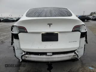 2020 Tesla Model Y Long Range with VIN 5YJYGDEE5LF053938, listed as a Copart auction lot 43381985 with 69,291 mi miles and Salvage Title. Bid and sale history available at DreamBid. Image 6.
