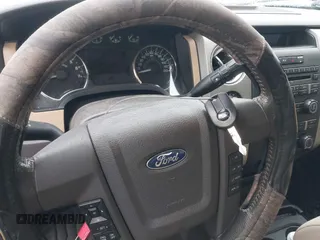 2011 Ford F-150 XL with VIN 1FTFW1EF1BFB28727, listed as a IAAI auction lot 42386989 with 179,086 mi miles and . Bid and sale history available at DreamBid. Image 11.
