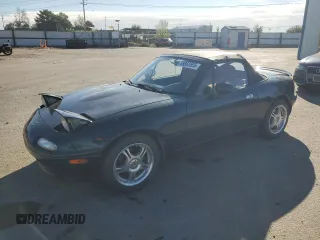 1995 Mazda MX-5 Miata z VIN JM1NA353XS0619585, wystawiony jako Copart lot #55862555 z przebiegiem 91 233 mil mil oraz Szkoda całkowita • Salvage title. Historia ofert i sprzedaży dostępna na DreamBid. Obrazek 1.