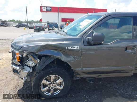 2019 Ford F-150 XL with VIN 1FTEW1E52KKE98899, listed as a IAAI auction lot 42576904 with 168,223 mi miles and . Bid and sale history available at DreamBid. Image 18.