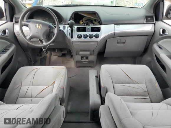 2010 Honda Odyssey LX with VIN 5FNRL3H29AB005111, listed as a Copart auction lot 65005735 with Not provided miles and Clean title. Bid and sale history available at DreamBid. Image 8.