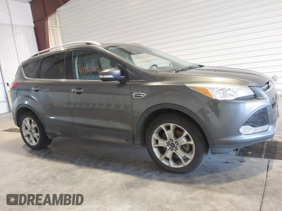 2016 Ford Escape Titanium with VIN 1FMCU9J9XGUC30596, listed as a IAAI auction lot 42024166 with 179,340 mi miles. Bid and sale history available at carsss.com. Image 13.