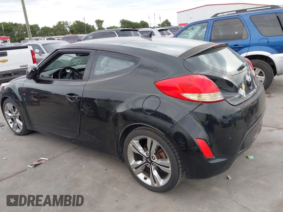 2013 Hyundai Veloster w/Black Int z VIN KMHTC6AD7DU152800, wystawiony jako IAAI lot #42477655 z przebiegiem 93 169 mil mil oraz . Historia ofert i sprzedaży dostępna na DreamBid. Obrazek 3.