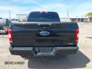 2018 Ford F-150 XL with VIN 1FTEX1EP7JFC21008, listed as a IAAI auction lot 42072145 with 102,679 mi miles and . Bid and sale history available at DreamBid. Image 16.