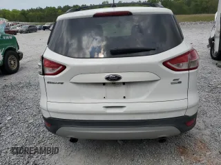 2014 Ford Escape SE z VIN 1FMCU9GX2EUC85787, wystawiony jako Copart lot #52739085 z przebiegiem 123 641 mil mil oraz Szkoda całkowita • Salvage title. Historia ofert i sprzedaży dostępna na DreamBid. Obrazek 6.