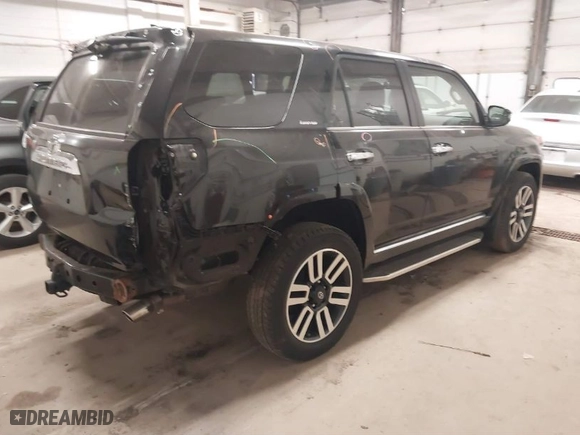 2014 Toyota 4Runner Limited with VIN JTEBU5JRXE5167219, listed as a IAAI auction lot 41835807 with 73,459 mi miles. Bid and sale history available at carsss.com. Image 4.