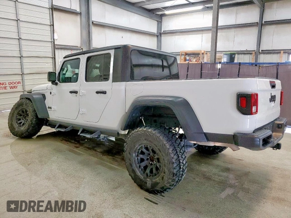 2023 Jeep Gladiator Sport S with VIN 1C6HJTAG1PL542530, listed as a Copart auction lot 60669075 with 44,323 mi miles and Salvage title. Bid and sale history available at DreamBid. Image 3.