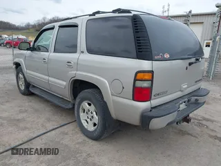 2004 Chevrolet Tahoe LS with VIN 1GNEK13Z74J181914, listed as a IAAI auction lot 41881310 with 213,223 mi miles. Bid and sale history available at carsss.com. Image 3.