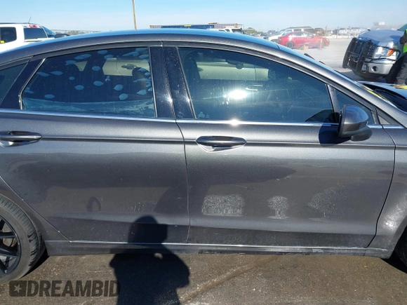 2018 Ford Fusion SE z VIN 3FA6P0H70JR191384, wystawiony jako IAAI lot #41340319 z przebiegiem 89 581 mil mil oraz . Historia ofert i sprzedaży dostępna na DreamBid. Obrazek 13.