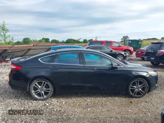 2013 Ford Fusion Titanium with VIN 3FA6P0K95DR153437, listed as a IAAI auction lot 42334754 with 139,623 mi miles and . Bid and sale history available at DreamBid. Image 13.