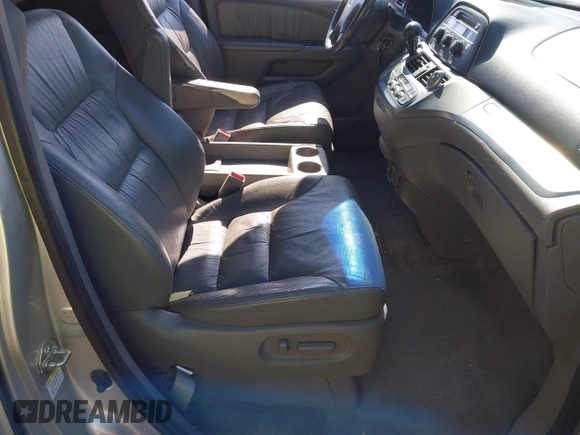 2008 Honda Odyssey EX-L with VIN 5FNRL38628B410157, listed as a IAAI auction lot 42072217 with 240,099 mi miles and . Bid and sale history available at DreamBid. Image 5.