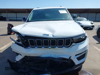 2022 Jeep Grand Cherokee with VIN 1C4RJYB66N8718018, listed as a IAAI auction lot 42002051 with Not provided miles and . Bid and sale history available at DreamBid. Image 11.