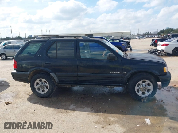 2001 Isuzu Rodeo S with VIN 4S2CK58W114363340, listed as a IAAI auction lot 41498698 with 185,408 mi miles and . Bid and sale history available at DreamBid. Image 13.