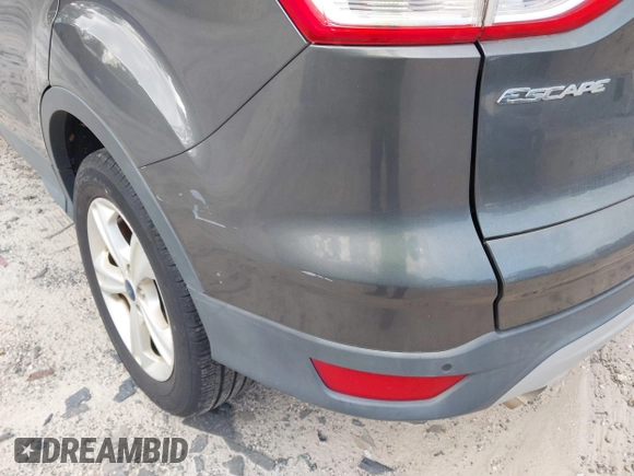 2016 Ford Escape SE with VIN 1FMCU0GX3GUC05279, listed as a IAAI auction lot 42142557 with 87,177 mi miles. Bid and sale history available at carsss.com. Image 12.