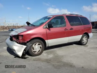 2000 Toyota Sienna LE with VIN 4T3ZF13C4YU227135, listed as a Copart auction lot 56706855 with 272,904 mi miles and Salvage title. Bid and sale history available at DreamBid. Image 1.