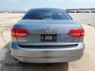 2015 Volkswagen Jetta S with VIN 3VW2K7AJ8FM242136, listed as a Copart auction lot 61063545 with Not provided miles and Salvage title. Bid and sale history available at DreamBid. Image 6.