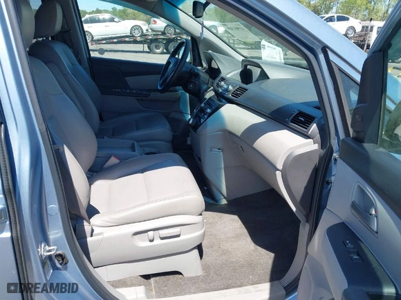 2013 Honda Odyssey Touring with VIN 5FNRL5H94DB069716, listed as a IAAI auction lot 41901369 with 243,492 mi miles. Bid and sale history available at carsss.com. Image 5.