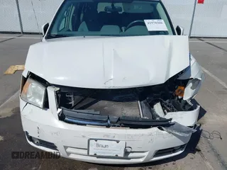 2010 Dodge Grand Caravan SXT with VIN 2D4RN5D14AR420265, listed as a IAAI auction lot 41970366 with 117,208 mi miles and . Bid and sale history available at DreamBid. Image 6.