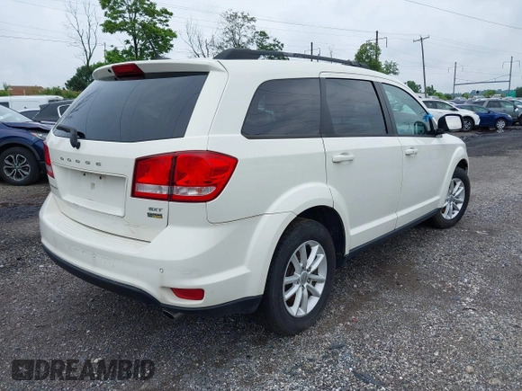 2017 Dodge Journey SXT with VIN 3C4PDDBG2HT702775, listed as a IAAI auction lot 42596303 with 130,639 mi miles and . Bid and sale history available at DreamBid. Image 4.