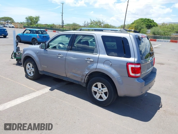 2008 Ford Escape Hybrid z VIN 1FMCU49HX8KC68082, wystawiony jako IAAI lot #42806471 z przebiegiem 104 848 mil mil oraz . Historia ofert i sprzedaży dostępna na DreamBid. Obrazek 3.