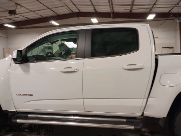 2018 Chevrolet Colorado 4WD LT с VIN 1GCGTCEN6J1105312, выставлен на аукционе IAAI как лот 41937527 с пробегом 81 271 миль миль и . История ставок и продаж доступна на DreamBid. Изображение 15.