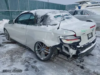 2018 BMW 2 Series 230i xDrive with VIN WBA2K1C52JVB64595, listed as a IAAI auction lot 41604748 with 47,461 mi miles. Bid and sale history available at carsss.com. Image 3.